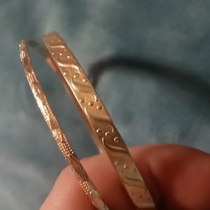 2 gold tone bangle bracelets